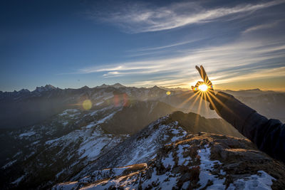 Scenic view of landscape against sky during sunset