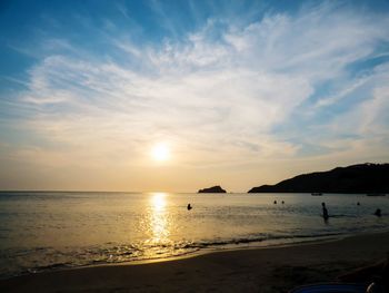 Scenic view of sea at sunset