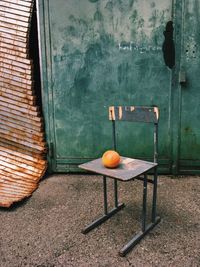 View of orange fruits on wooden door