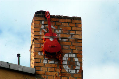 Low angle view of brick wall