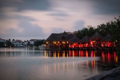 Reflection of illuminated buildings in water