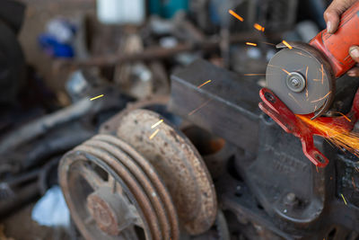 Close-up of hand holding machine