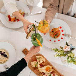 Midsection of woman preparing food on table