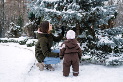 Winter walks with babies and young children. baby toddler in winter, how to protect kids in cold