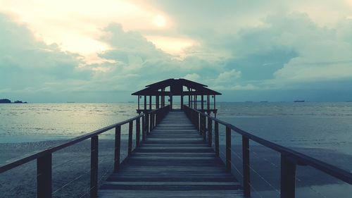 Pier on sea against sky