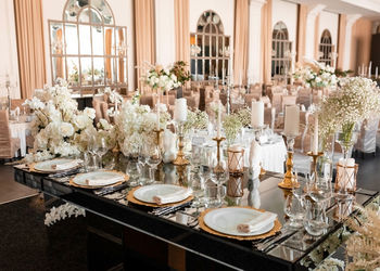 Wedding table floral arrangements for newlyweds. luxury decor in expensive tones