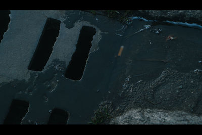 High angle view of wet road during winter