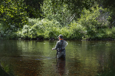 Man fishing in river