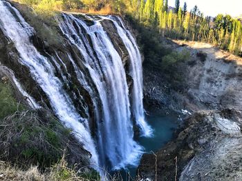 View of waterfall in forest