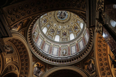 Low angle view of ornate ceiling in historic building