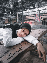 Portrait of boy in park during winter