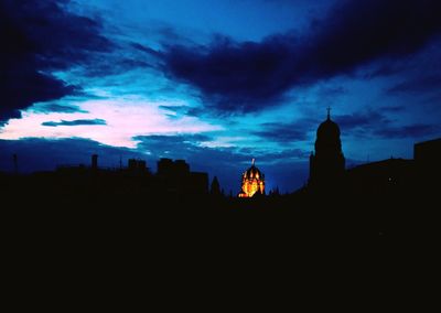 Silhouette of buildings at dusk