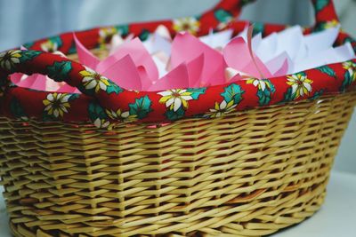 Close-up of multi colored flowers in wicker basket