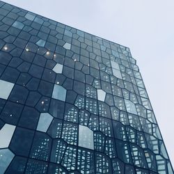 Low angle view of modern building against clear sky