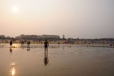 Scenic view of beach at sunset