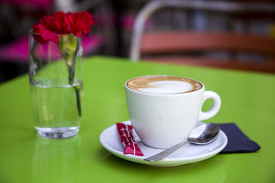 Close-up of coffee cup on table