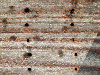 Full frame shot of weathered brick wall