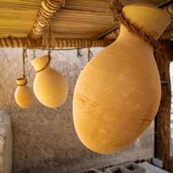 Close-up of fruits hanging on table