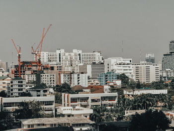 Buildings in city against sky