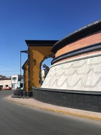 Low angle view of building against blue sky