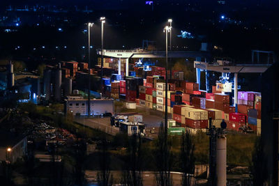 Illuminated buildings in city at night