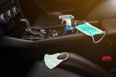 High angle view of shoes in car