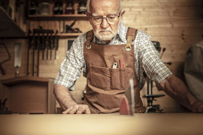 Man working on wood