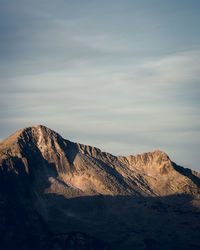 Rocky mountain against sky