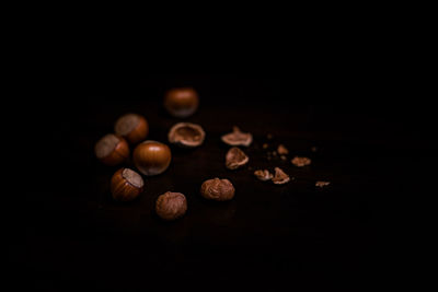 Close-up of candies against black background