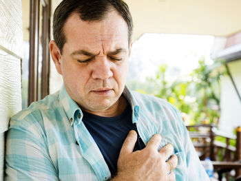 Mature man suffering from chest pain
