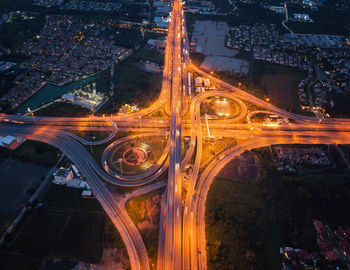 High angle view of illuminated bridge at night