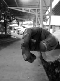 Close-up of man holding hands