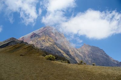 Panoramic view of volcanic landscape against sky