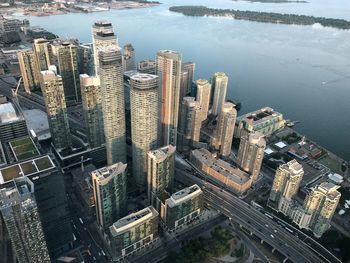 High angle view of river amidst buildings in city