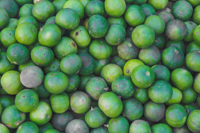 Full frame shot of oranges in market