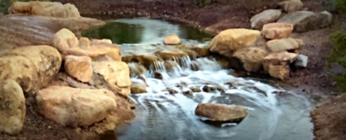 Stream flowing through rocks