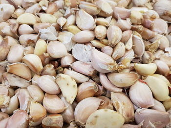 Full frame shot of onions for sale at market