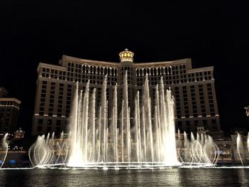 Low angle view of fountain at night