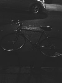 High angle view of bicycle parked on road