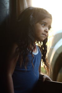 Portrait of young woman looking away