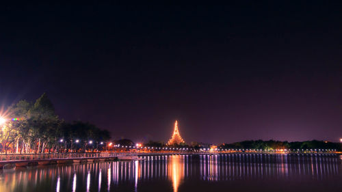 Illuminated building lit up at night