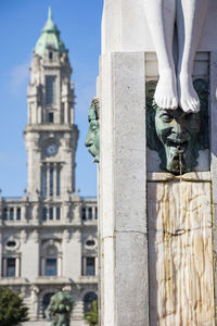 Low angle view of statue against building