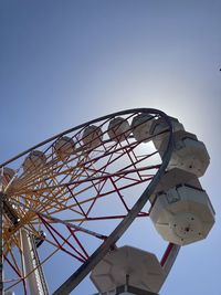 Low angle view of metallic structure against clear blue sky