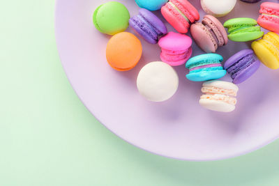 High angle view of multi colored candies on table