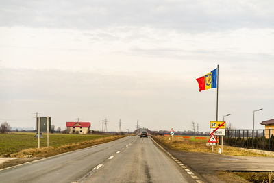 Empty road against sky