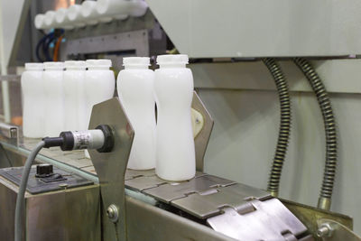 Close-up of machine part on table