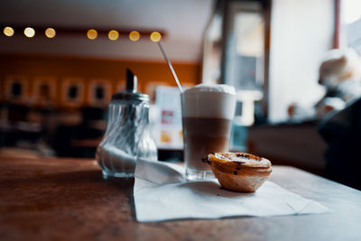 Close-up of coffee cup on table