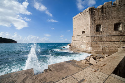 View of fort against cloudy sky