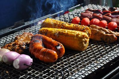 Close-up of meat on barbecue grill