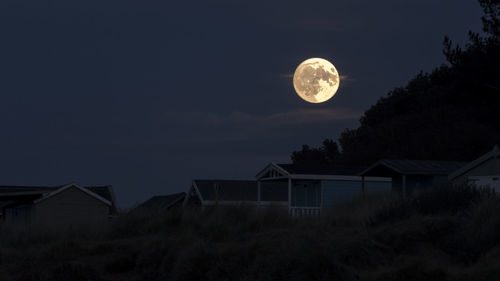 Low angle view of house against sky at night